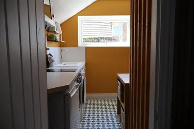 a small kitchen with a sink and a window at Filey in Moffat