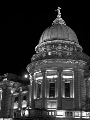 a black and white photo of a building at night at Glasgow Apartment near Hydro & SECC, Finnieston in Glasgow