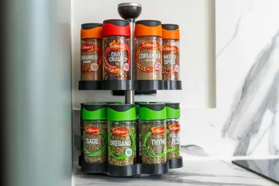 a spice rack in a refrigerator at Bright & Modern 3-Bed House Next To Glasgow Airport in Abbotsinch