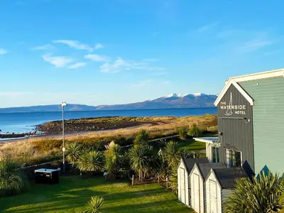 a house with a view of the ocean at The Waterside Hotel & Spa in Seamill