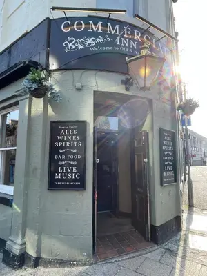 a entrance to a restaurant with a sign on the door at Foundry Street Apartment 1 - Dunfermline City Centre in Dunfermline
