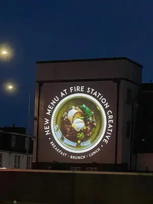 a large sign on the side of a building at Foundry Street Apartment 3 - Dunfermline City Centre in Dunfermline