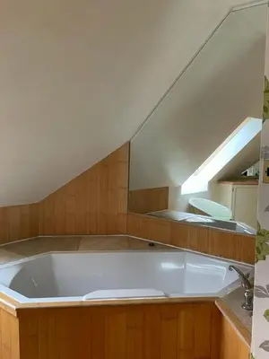 a large white bath tub in a room at Inveraray, Loch Awe Rooms and Apartments in Portsonachan