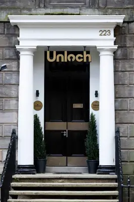 a sign on the door of a hotel at Luxury Refurbished City Retreat in Glasgow