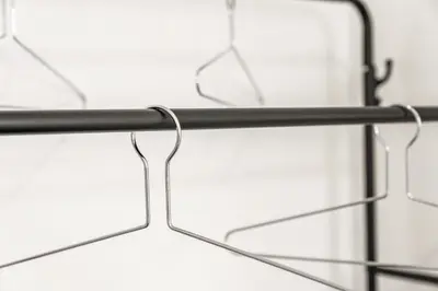a metal rack with glasses on it at Cosy and Bright 3-Bedroom Flat in Glasgow