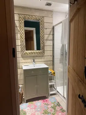 a bathroom with a sink and a mirror at The Rookery in Moffat