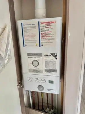 a refrigerator with the top of it in a room at Four-bed Delta Caravan, Uddingston, Glasgow Located in Uddingston, Glasgow at Maryville Caravan Site in Uddingston