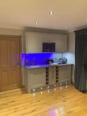 a kitchen with a blue counter top in a room at The Allanbreck Studio Glencoe Ballachulish Highlands Near Fortwilliam in Glencoe