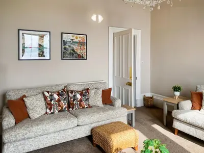a living room with a couch and a chair at Thornlie - Uk49875 in Blairmore