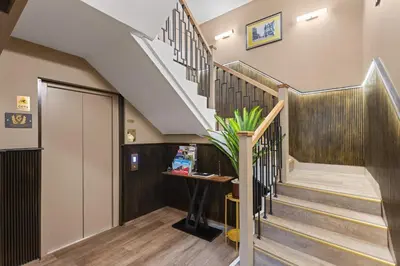 a staircase in a house with a stair case at City Centre Luxury Studio for 2 in Edinburgh