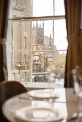 a view of the big ben clock tower from a window at Prime Central Edinburgh 3 bed in Edinburgh