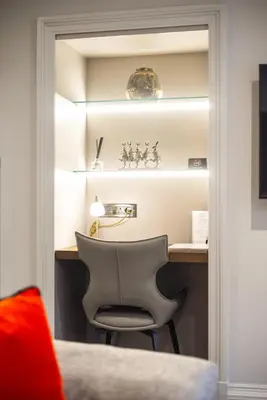 a room with a desk and a chair in a room at Central Edinburgh Prime Luxury in Edinburgh