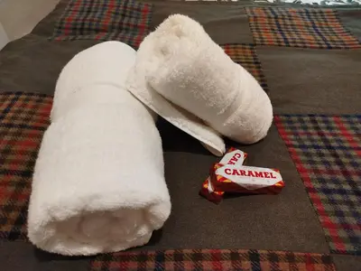 a white stuffed animal with a bar of candy at Lovely flat in Gorgie, Edinburgh in Edinburgh