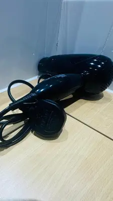 a pair of phones sitting on top of a desk at City Central Stay in Glasgow