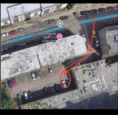 an overhead view of a parking lot with a red circle at this flat is permenantly removed from bkngcom list in Moffat