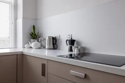 a kitchen with a sink and a counter top at Antonine Quarters in Grahamston