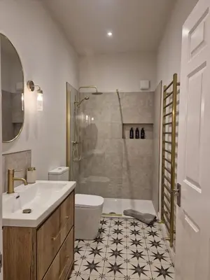 a bathroom with a sink and a toilet and a shower at City Residence Free Parking in Stirling