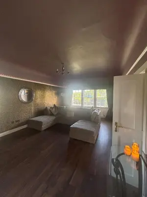 a living room with a couch and a table at Brig o Doon 3 in Ayr