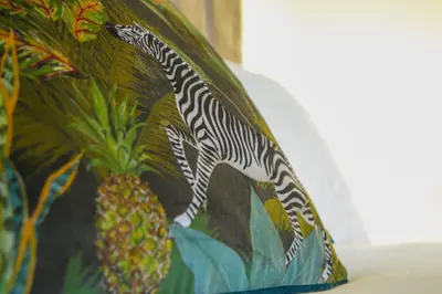 a painting of a zebra running next to a pineapple at Group Stay 3BR Close to Hydro and SECC with Parking in Govan