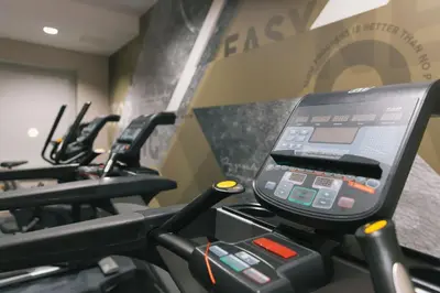 a cell phone on a treadmill in a gym at For Students Only - Bath Street in Glasgow in Glasgow