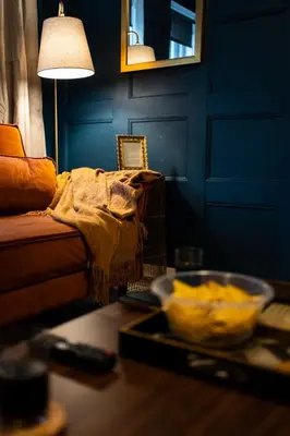 a living room with a table with a bowl of food at Finnieston 1BR - Walk to Hydro & SEC - Parking in Glasgow