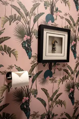 a picture frame on a wall with tropical wallpaper at Finnieston 1BR - Walk to Hydro & SEC - Parking in Glasgow