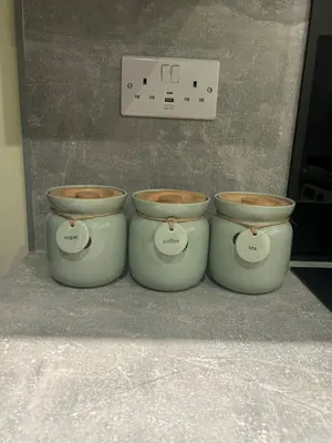 three pots sitting on a counter in a kitchen at Sugar boat view in Greenock