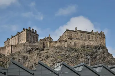 a castle sitting on top of a mountain at For Students Only - Kings Stables Road in Edinburgh in Edinburgh