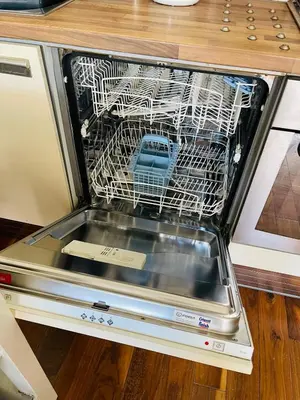 a dishwasher with a car inside of it at Lovely 2 bedroom apartment in Ayr town centre in Ayr