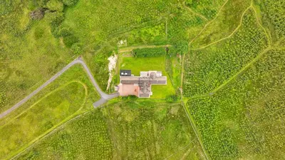 an aerial view of a house in a field at Finest Retreats - Grassyards House in Largs