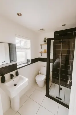 a bathroom with a sink and a toilet at 3BR Detached Home, Driveway & Large Rear Garden in Hogganfield