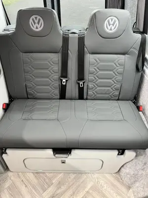 a seat in the back of a volkswagen van with the trunk open at Campervan Scotland, Glen Roamer in Braco