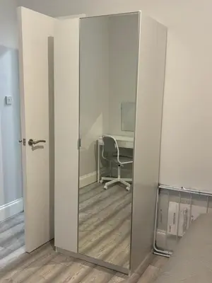 an open sliding glass door in an office with a desk at Seaside Escape 101 Nelson Largs in Largs