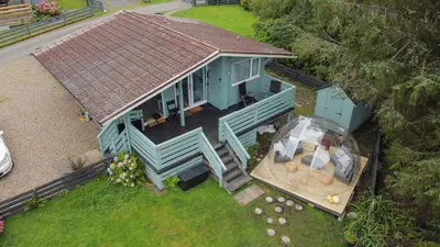 an overhead view of a blue house with a deck at Scarba in Oban