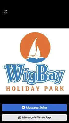 a logo for a holiday park with a sailboat in the center at 20 Chestnut Grove in Stranraer