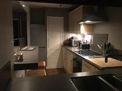 a kitchen with a sink and a counter top at 2 new bold lawns leamington spa in Moffat