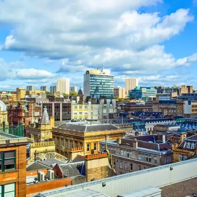 a view of a city skyline with buildings at Stylish Merchant City Flat Glasgow in Glasgow