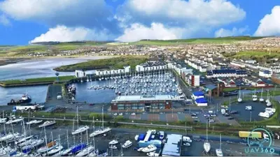 an aerial view of a marina with boats at Ta'Pinu House and Spa in Horse Isle