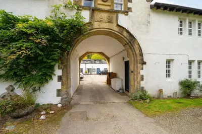an archway in the side of a building at The Granary in Dunira