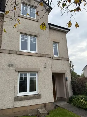 a house with three windows on the side of it at Luxury townhouse in Stirling in Stirling
