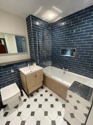 a bathroom with a tub and a toilet and a sink at Fordells Lodgings Stylish Rooms in Historic Townhouse in Inverkeithing