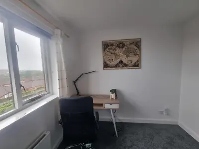 an office with a desk and a chair and a window at Cheerful two bedroom home in Dunfermline in Dunfermline