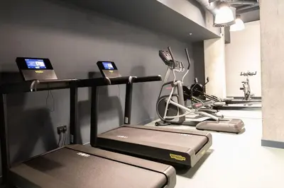 a gym with several treadmills and a treadmill at For Students Only Martha Street Glasgow in Glasgow
