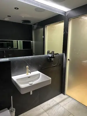 a bathroom with a sink and a shower at 2-Bed - Sleeps 6 - Pet Friendly with Free Parking in Falkirk