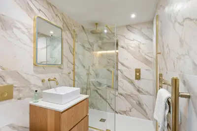 a bathroom with a sink and a shower at The Kings Park Luxury Residence in Stirling