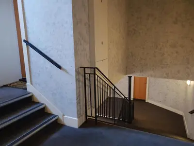 a staircase in a building with a stair case at Perfect Stay Near Glasgow Town in Glasgow
