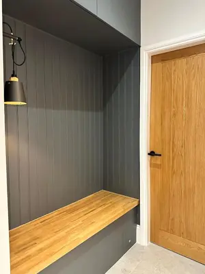 a room with a wooden counter next to a door at Glasgow West End Tenement Apartment in Glasgow