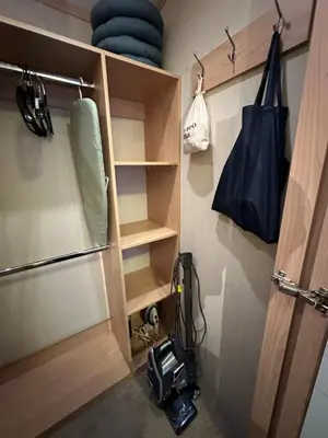 a camera and a bag in a room at Glen-coo in Auchterarder