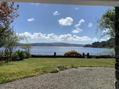 a view of the water from a house at Kilfinichen Church in Kilfinchen