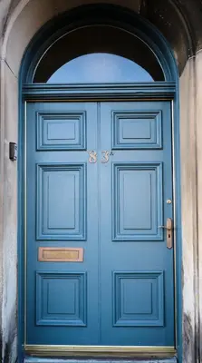 a blue door with an arch above it at Bruce on the Row-Historic Elegance near Edinburgh by Urban Haggis Stays in Dunfermline